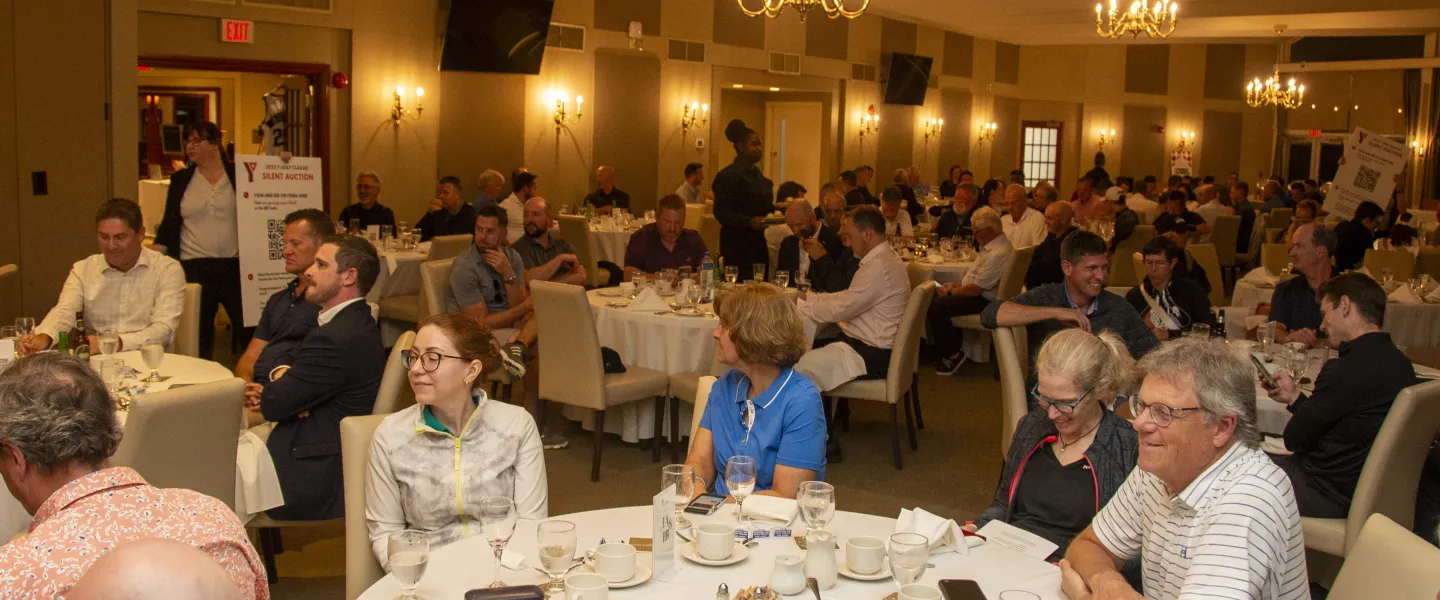 A reception hall full of people