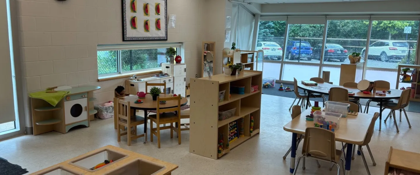 Avalon child care room of child-sized furniture and toys