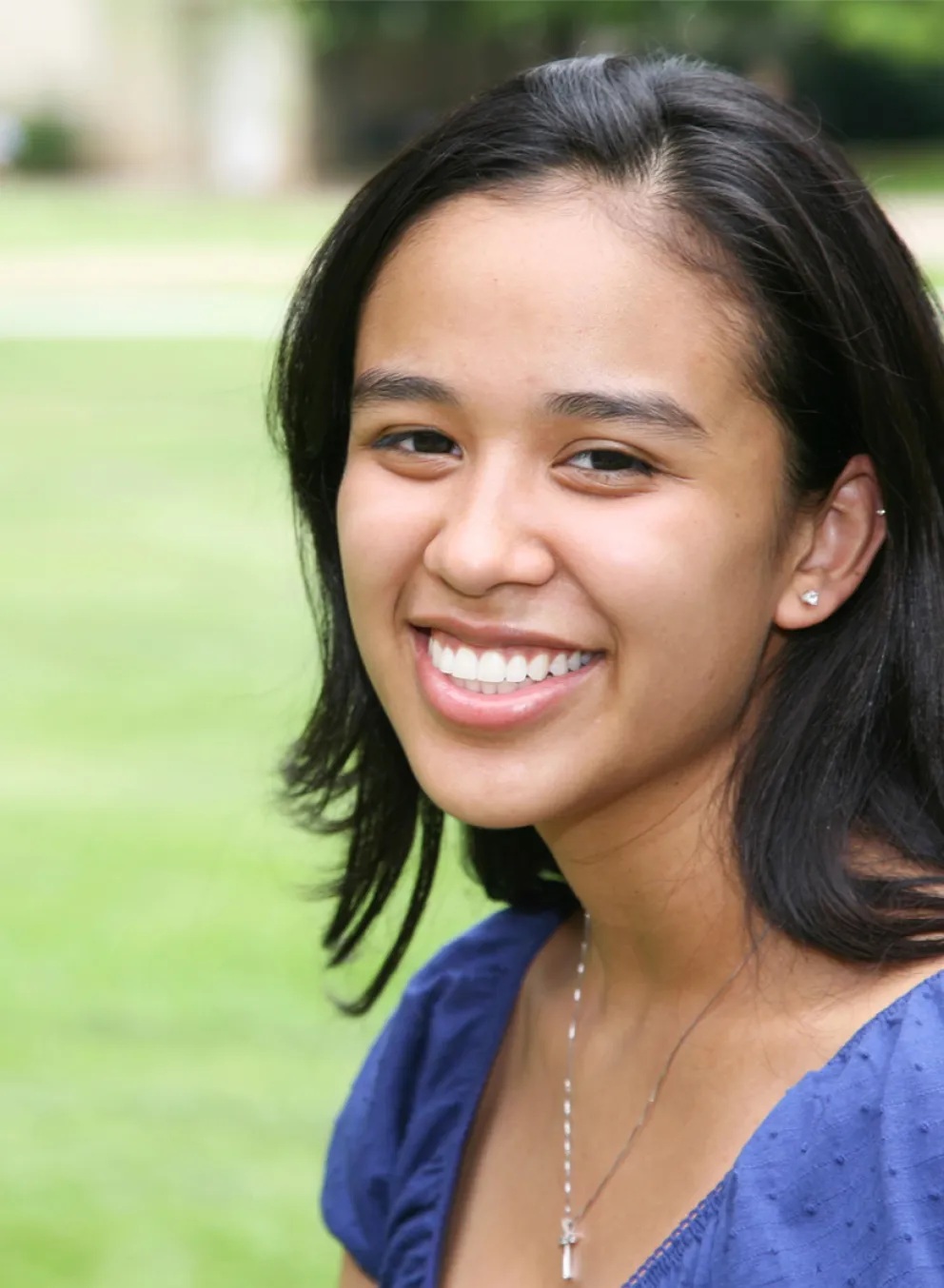 A smiling young woman.