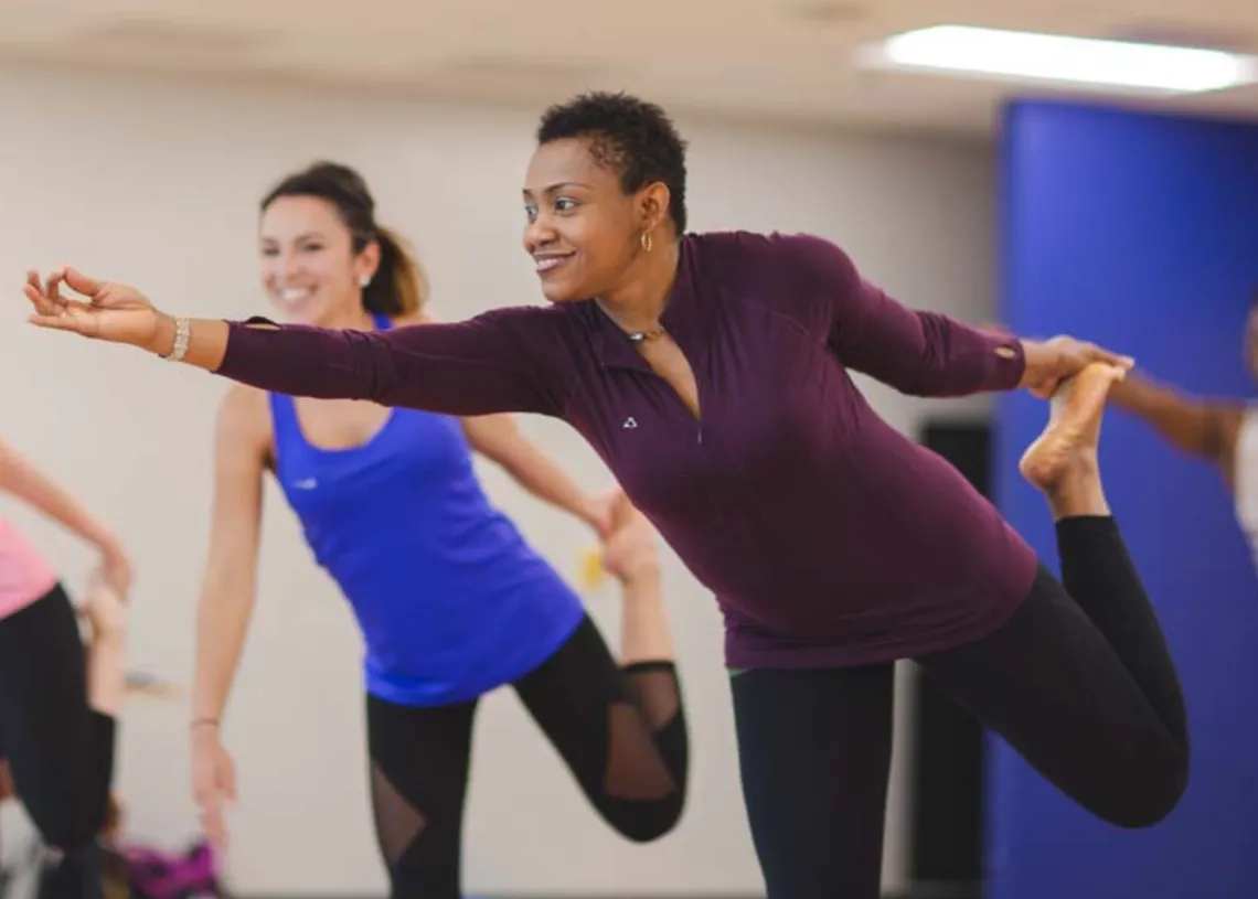 Two women in a yoga class.